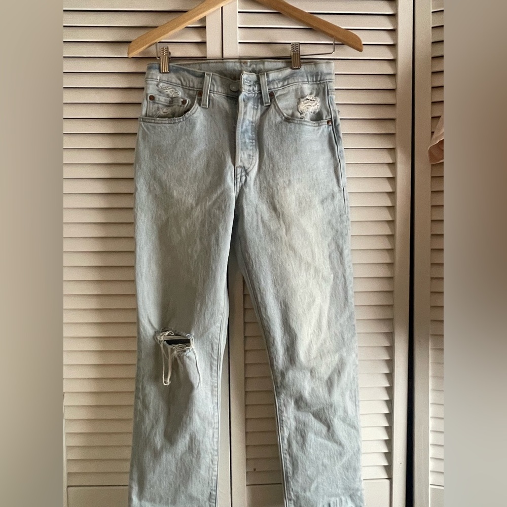 Levi’s light washed distressed jeans